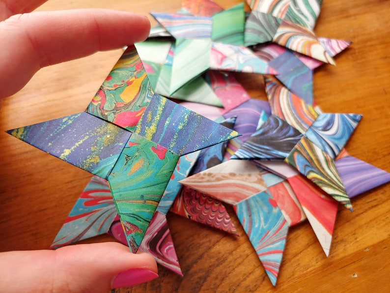 12pc Hand folded Origami Throwing Stars Shuriken Ninja Stars Finished 12pc Hand folded Origami Throwing Stars Shuriken Ninja Stars Finished