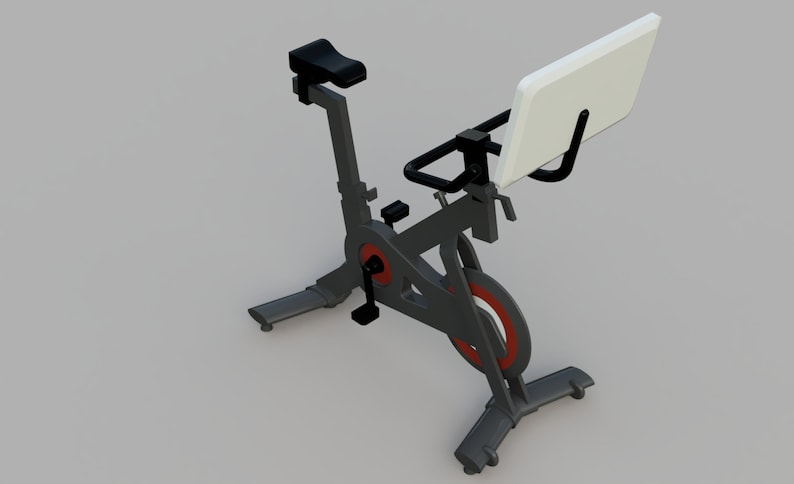 Puede incluir: Una bicicleta de ejercicio est&aacute;tica negra con un asiento acolchado blanco y una franja roja en la rueda. La bicicleta tiene un manillar negro con un soporte de tableta blanco.