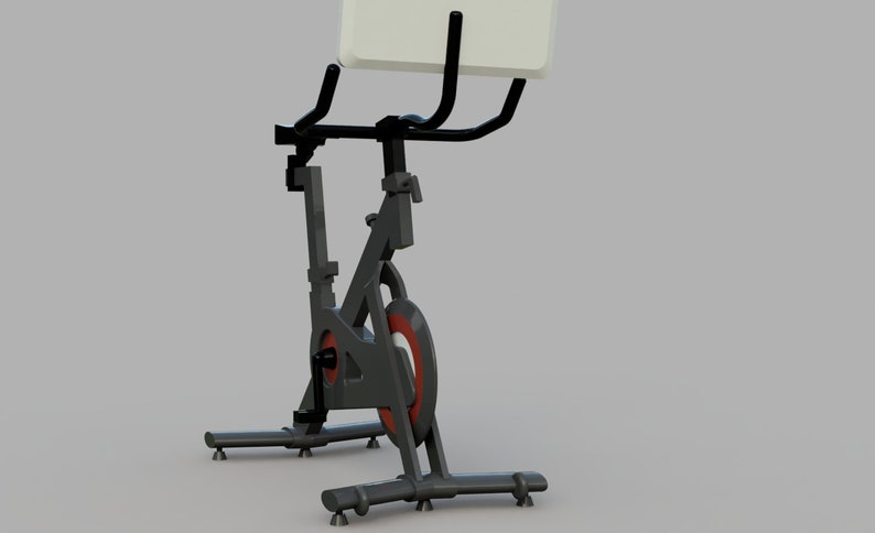 Puede incluir: Bicicleta de ejercicio est&aacute;tica negra con una rueda roja y blanca y un manillar negro con un soporte de tableta blanco.