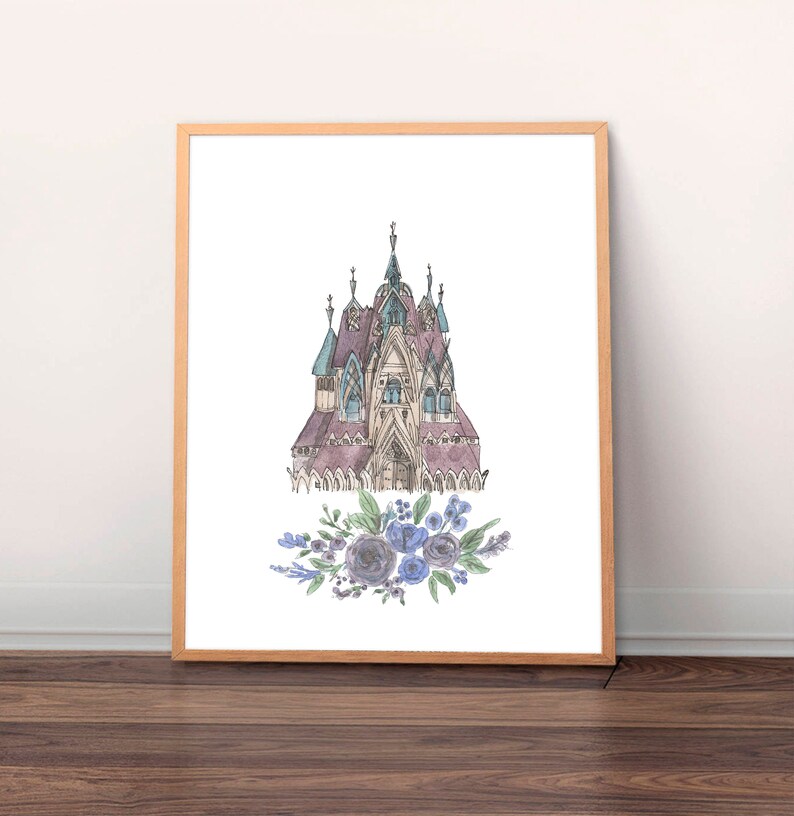 May include: A watercolor painting of a purple and blue castle with a floral wreath at the bottom. The castle has a pointed roof and many windows. The flowers are blue and purple.