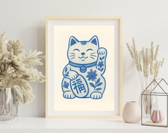 May include: A blue and white ceramic Maneki-Neko, or lucky cat, with a raised paw, floral details, and the Chinese character for "fortune" on its chest.