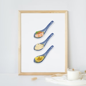 May include: Three blue and white porcelain spoons with different Asian dishes inside. The spoons are arranged vertically, with the top spoon containing a shrimp dish, the middle spoon containing noodles, and the bottom spoon containing a dumpling.