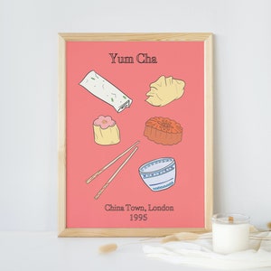 May include: A framed print with a pink background and the text "Yum Cha" in black. The print features illustrations of various Chinese dim sum dishes, including dumplings, spring rolls, and a bowl of soup. The text "China Town, London 1995" is also included in black.