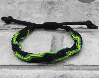 Jamaica Colours Vortex Braided Bracelet. Black, Gold & Green Cord Knot Bracelet.