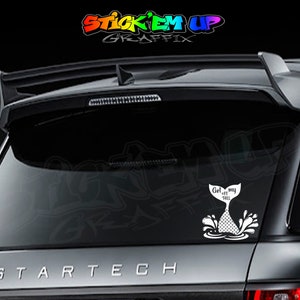 May include: White vinyl decal of a mermaid tail with the text "Get off my tail" on a black car.