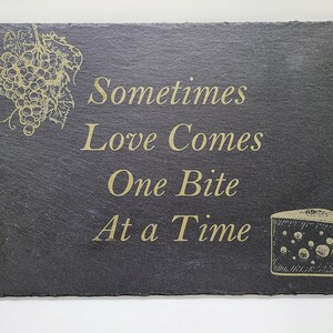 Sometimes Love Comes One Bite At A Time engraved slate charcuterie board