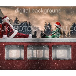 May include: Santa Claus and a child in a green and white striped elf costume sit on top of a red train car. The train car has windows and a snowy background.