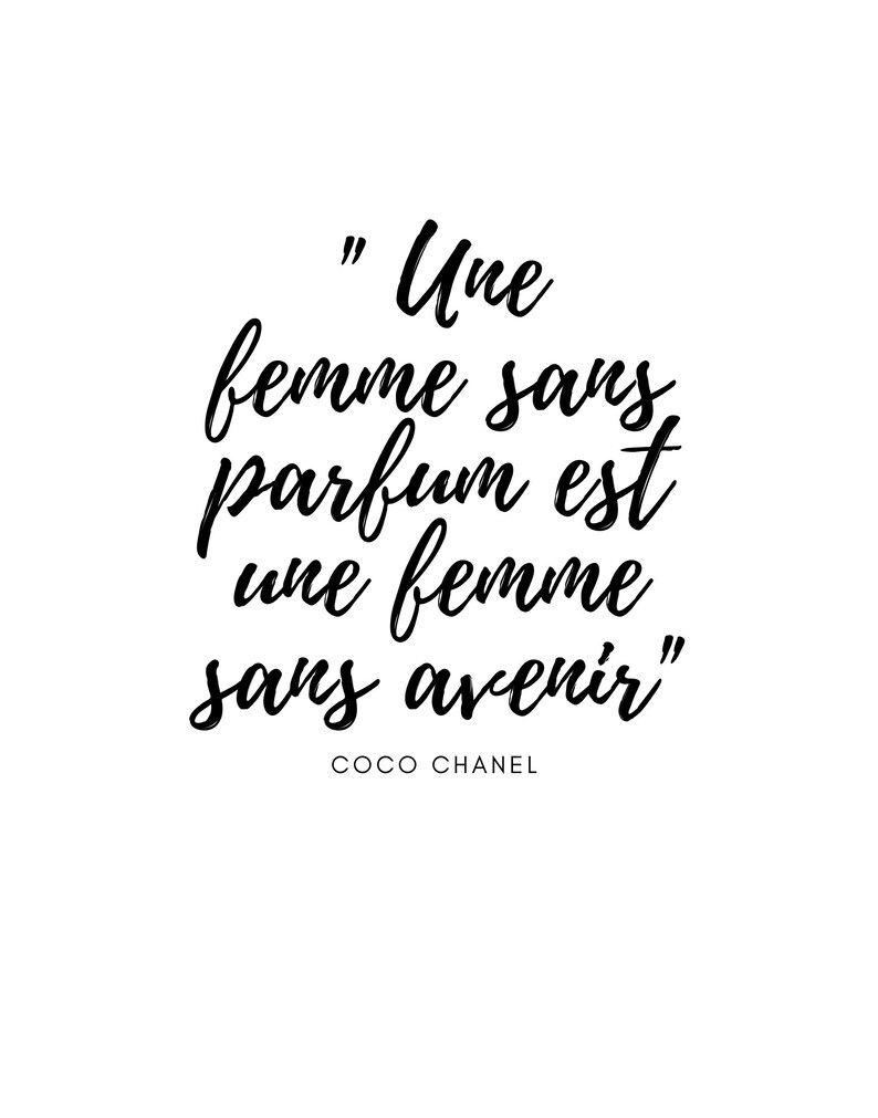 May include: Black and white typography quote in a cursive font. The quote reads "Une femme sans parfum est une femme sans avenir" by Coco Chanel.