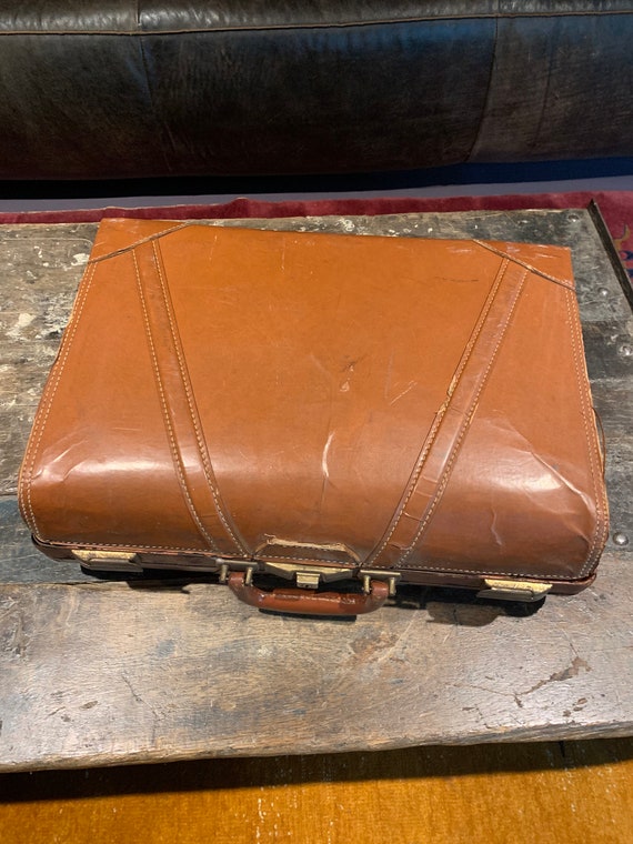 Vintage leather suitcase, by H. J. Cave and Sons of London, with two button  slide locks to front, leather handles, reinforced leather corners,  manufacturer's label to interiors, L64cm - Collectors & Clearance Sale