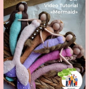 May include: A DIY video tutorial for making felt mermaid dolls. The tutorial includes English subtitles. The image shows a group of felt mermaids in various colours, including teal, brown, purple, pink, and light brown. The mermaids are arranged in a circle, with their tails facing outwards. The mermaids have long brown hair and are decorated with white beads. The image also includes a logo for the company, FELTGIFT, which is a family of people standing under a tree.