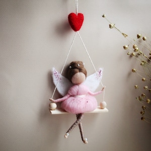 Felt fairy brown hair in pink dress fairy ornaments Little fairy decor on the wooden swing Fairy on the swing