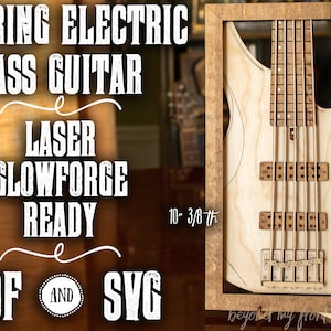 Pode incluir: Uma guitarra elétrica de 5 cordas cortada a laser em madeira e enquadrada em uma moldura de madeira marrom. A moldura mede 45,7 cm por 26,3 cm. A guitarra mede 26,3 cm de altura. A imagem inclui o texto "5 STRING ELECTRIC BASS GUITAR LASER GLOWFORCE READY PDF AND SVG beyond my front porch".