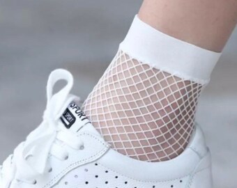 white fishnet socks with bow