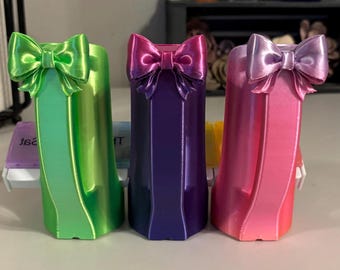 Slim can energy drink holder with bow