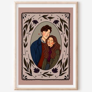 May include: A digital illustration print featuring a couple inside an oval frame decorated with dark leaves and flowers. The person on the left wears a blue coat and red sweater, while the person on the right has long brown hair and glasses.