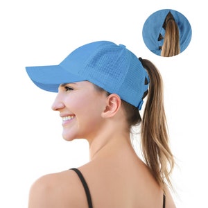 Cap with ponytail hole outlet