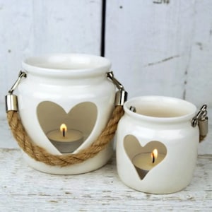 Set of 2 white ceramic heart tea light holders candle lanterns