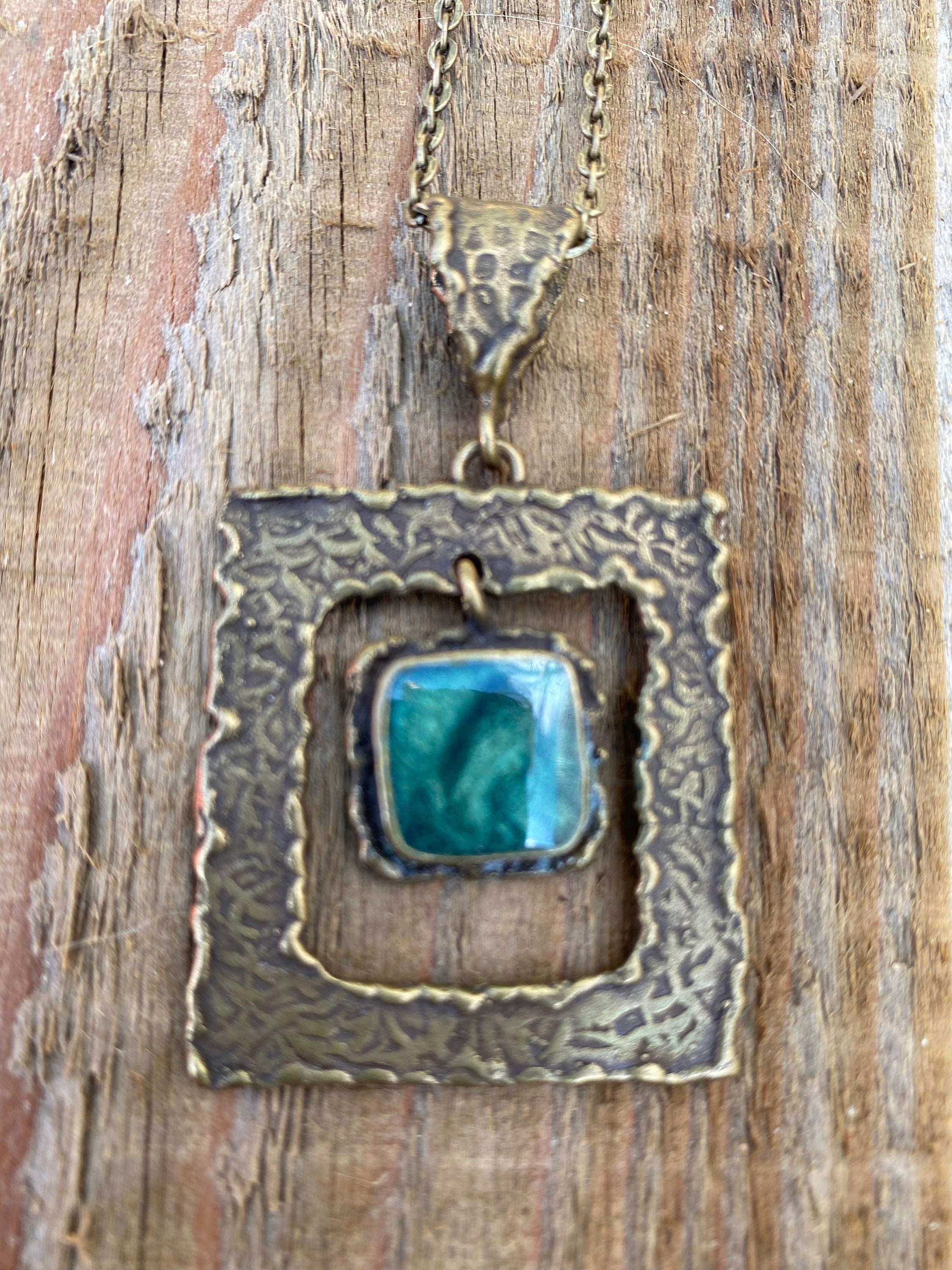 Antique Bronze coloured Pendant with Emerald centre Etsy