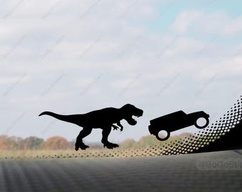 May include: A black silhouette of a Tyrannosaurus Rex dinosaur chasing a black silhouette of a car on a white background with a black and white dotted pattern.