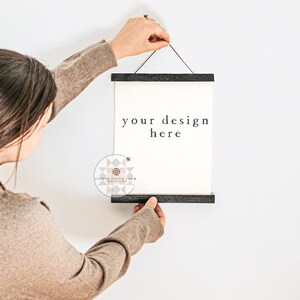 Small Wall Hanging Art Mockup | Canvas Art with Black Framing | Interior Scene with Model | JPEG Product Photography