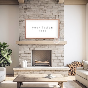 以下が含まれることがあります： 白いソファ、コーヒーテーブル、暖炉、暖炉の上に「your design here」と書かれた額縁付きのプリントがあるリビングルームのインテリアです。