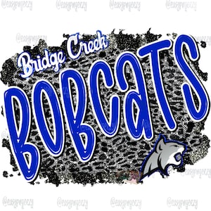 May include: A black and white graphic with a blue text overlay that reads "Bridge Creek Bobcats". A gray bobcat mascot is in the lower right corner of the graphic.