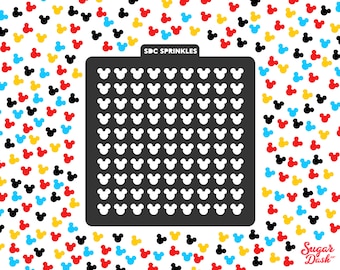 May include: A black stencil with a grid of 10 rows and 10 columns of white Mickey Mouse head shapes. The stencil is labeled "SDC SPRINKLES".