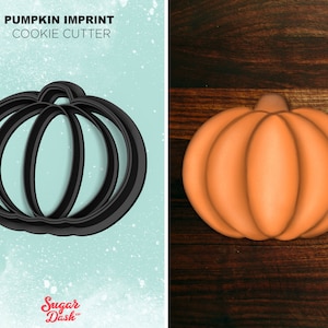 May include: A black pumpkin cookie cutter with a detailed imprint design. The cutter is shown on a light blue background with white speckles. The text "Pumpkin Imprint Cookie Cutter" is above the cutter. The text "Sugar Dash" is at the bottom of the image.