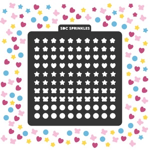 May include: Black stencil with white outlines of hearts, stars, butterflies, and circles. The stencil is labeled "SDC Sprinkles".