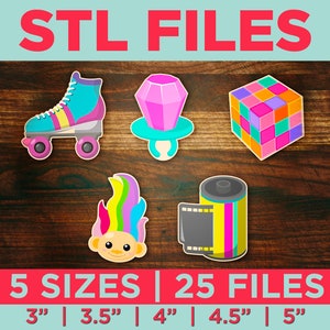 May include: Five colorful 3D printable designs: roller skates, a ring with a gem, a Rubik's cube, a troll doll, and a film canister. STL files are available in five sizes: 3 inches, 3.5 inches, 4 inches, 4.5 inches, and 5 inches.