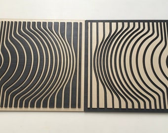 May include: Two rectangular wooden wall art pieces. One features a black wavy design on a light wood background, and the other has a light wood wavy design on a black background. The wavy lines create a 3D effect.
