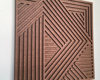 May include: A brown wooden wall art piece with a geometric design of overlapping lines and shapes.
