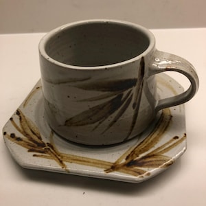 Handmade studio  pottery cup with saucer , coffee cup , bamboo