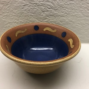 Deep pottery bowl plate signed