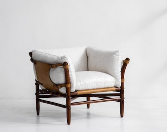 Silla Wanderer Safari: tela color marfil con detalles en piel