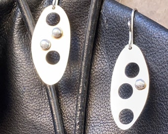 Oval shaped sterling silver dangling earrings