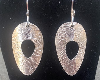 Handcrafted sterling silver teardrop shaped earrings