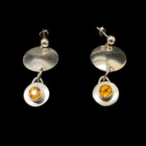 Dangling sterling silver earrings, two connected circles - beautiful orange stone.
