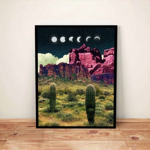 May include: A digital art print featuring a desert landscape with red rock formations and two cacti in the foreground. The sky is dark blue with a crescent moon and stars.