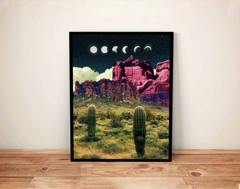 May include: A digital art print featuring a desert landscape with red rock formations and two cacti in the foreground. The sky is dark blue with a crescent moon and stars.