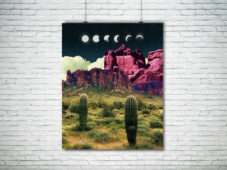May include: A digital art print featuring a desert landscape with a pink mountain range, two cacti, and a night sky with a crescent moon and stars.