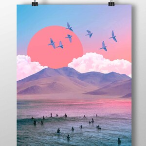 May include: A digital collage of a pink sunset over a mountain range with a group of surfers in the ocean below. The sky is a gradient of pink, blue, and purple, and there are white clouds in the sky. There are several birds flying in the sky.