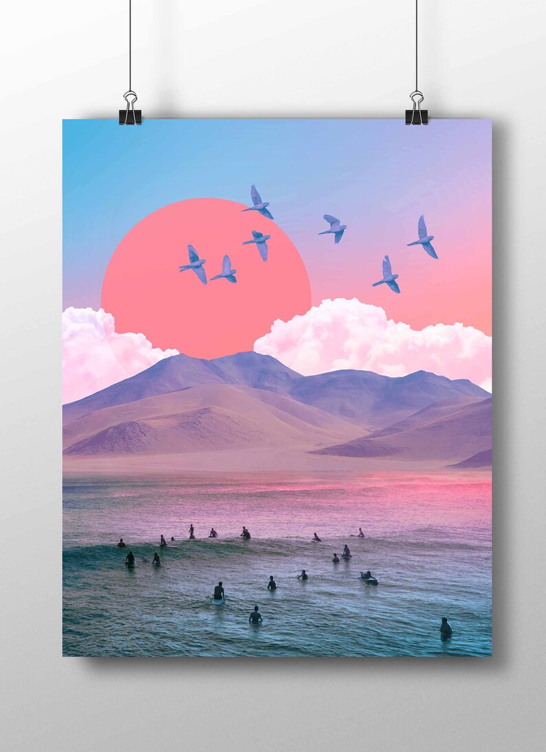 May include: A digital collage of a pink sunset over a mountain range with a group of surfers in the ocean below. The sky is a gradient of pink, blue, and purple, and there are white clouds in the sky. There are several birds flying in the sky.