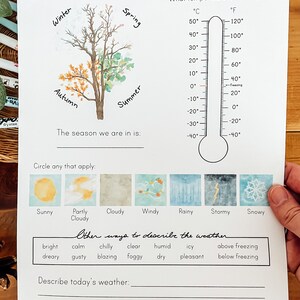 May include: A printable worksheet for kids to learn about the seasons and weather. The worksheet features a tree with four seasons, a thermometer, and a weather chart with icons for sunny, partly cloudy, cloudy, windy, rainy, stormy, and snowy. The worksheet also includes a section for describing the weather.