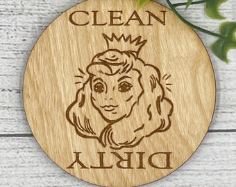 May include: A round wooden sign with the words "CLEAN" and "DIRTY" on it. A cartoon image of a woman with a crown is in the center of the sign.