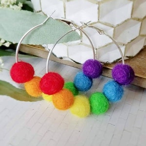Rainbow pom pom earrings shop