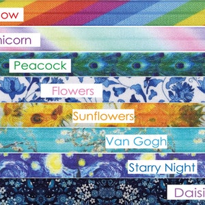 May include: A set of colorful elastic hair ties with various patterns, including a rainbow, unicorn, peacock, flowers, sunflowers, Van Gogh's Starry Night, and daisies.