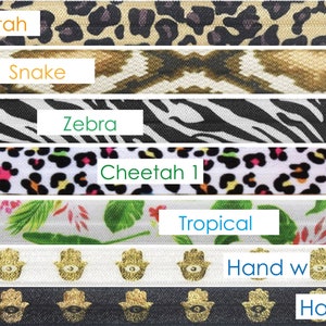 May include: Six different fabric strips with various animal prints and patterns. The strips are labeled "Cheetah", "Snake", "Zebra", "Cheetah 1", "Tropical", "Hand w", and "Hand b".