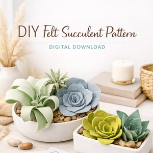 May include: DIY felt succulent pattern digital download. The image shows three felt succulent arrangements in white ceramic pots. The succulents are in shades of green and blue. Also included are felt sheets, pattern templates, and gold scissors.