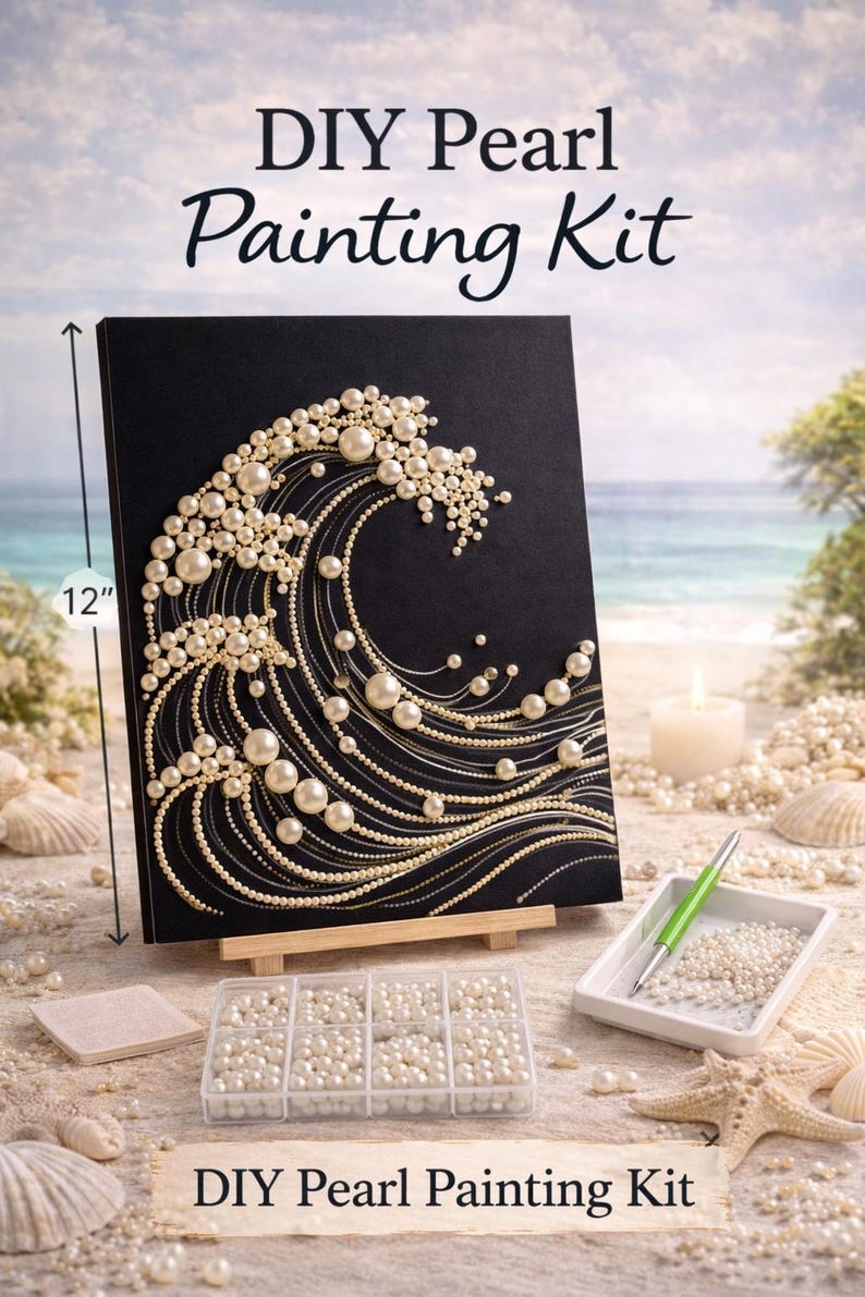 May include: A DIY Pearl Painting Kit featuring a black canvas with a pearl-embellished wave design. The canvas measures 12 inches in height. The kit includes a tray of loose white pearls, a green applicator tool, and a storage container.